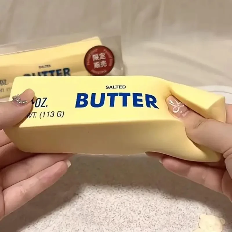 Sd9986ac565c9402eb462dce56ea830ebb.webp 1PC Slow Rising Squishy Butter Stick Antistress Fidget Toy Stress Relief Soft Squeeze Elastic Prank Toy for Adults Party Gift - Image 1