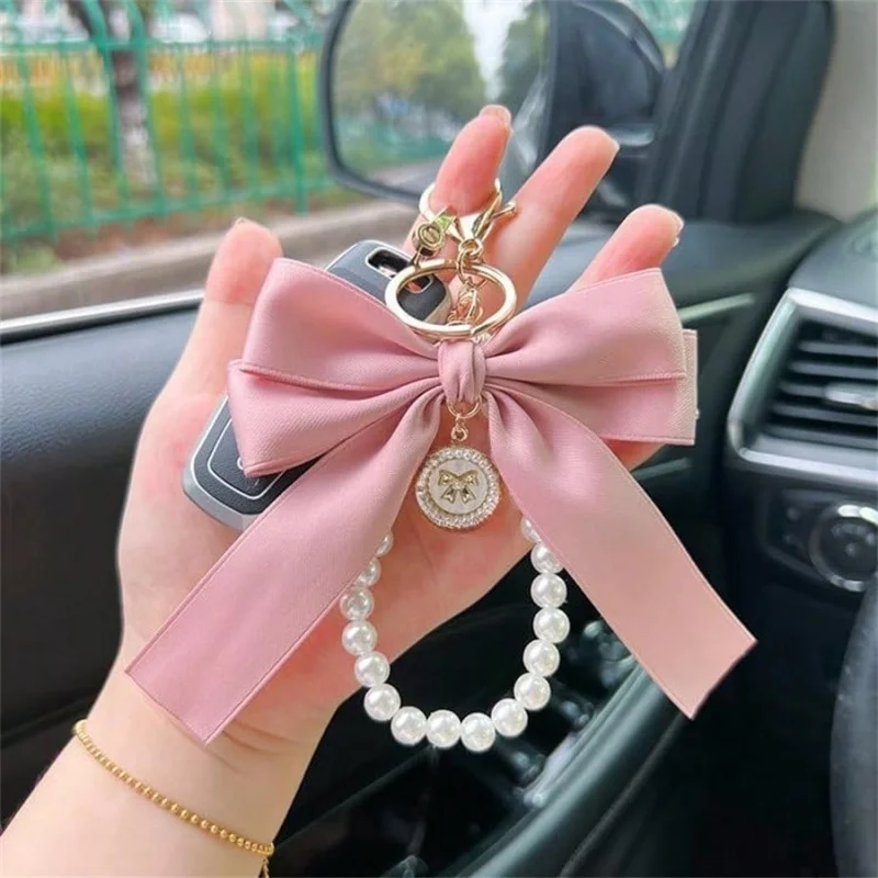 Se05ac66f022f43f499c5c479f30ee2afk.webp Keychain with Bow, Large Bow Tie, Carrying Bag for Hanging, Ornament, Bag Decorations, DIY Headphone Case, Accessories - Image 1